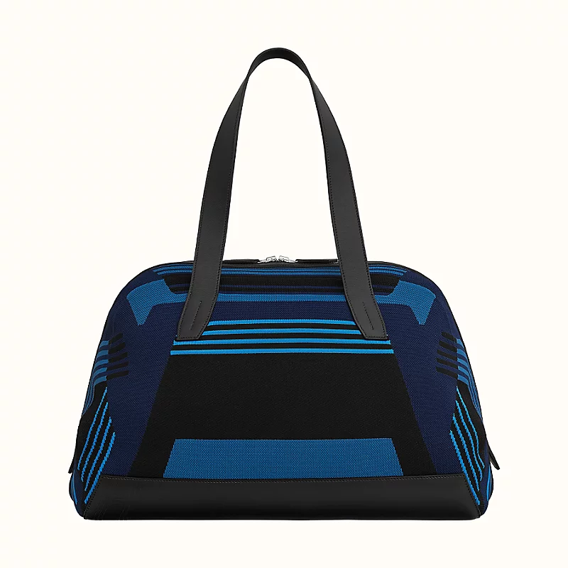 Image of Hermes Paris - Dynamo duffle bag product featured in fashion and lifestyle products section of designers corner of magzoid magazine