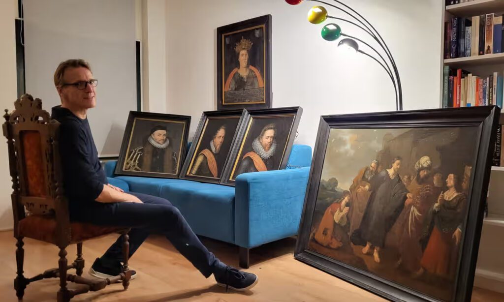 Image of Arthur Brand with Recovered Art: "Arthur Brand with Recovered Artwork"