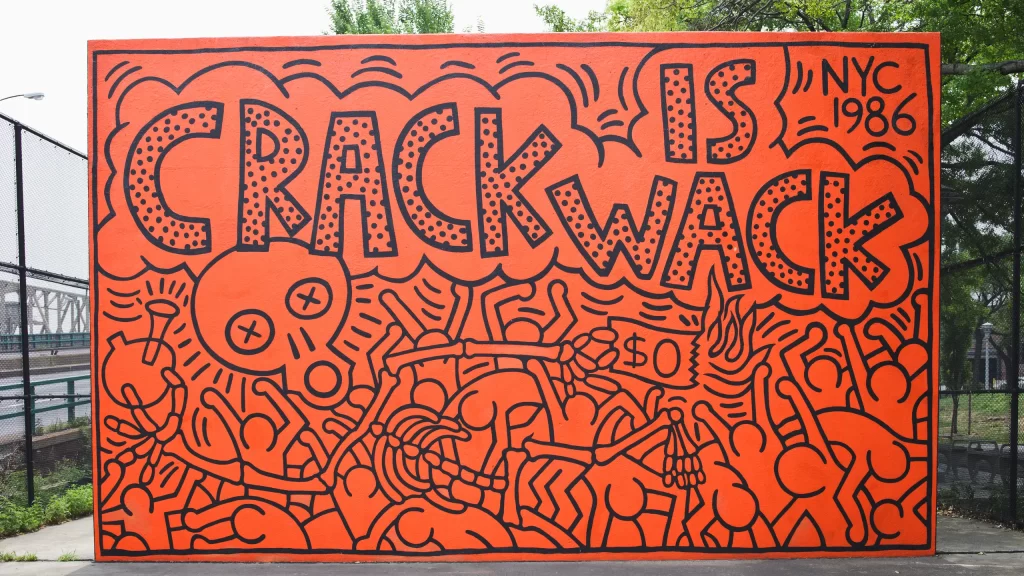"Keith Haring's 'Crack is Wack' mural featuring bold lines and vibrant colors."