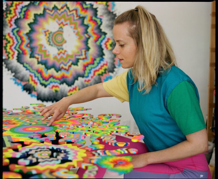 Vibrant, swirling art installation by Jen Stark, showcasing her unique blend of color and motion in contemporary art.
